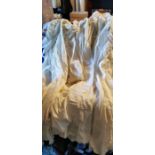 A collection of cream silk christening robes and night dresses. To include a christening robe robe