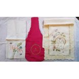 A small linen handkerchief case with handkerchiefs, embroidered in pink and a sprig of foliage and