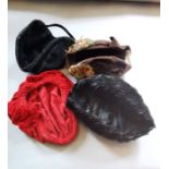 A collection of hats; dark brown felt, early 1950's, decorated with a colourful array of feathers