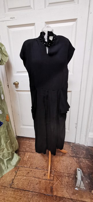 A black crepe late 1940s dress with cap sleeves, the v necklineand neckline are decorated in paste - Image 6 of 10