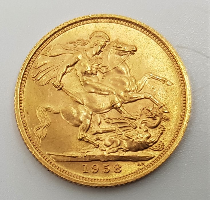 A 1958 Elizabeth II gold sovereign. - Image 2 of 2