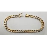 A 14ct. bi-colour gold curb link bracelet, formed from a series of alternating sets of four yellow