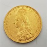 An 1890 Victoria "Jubilee bust" gold sovereign, London mint.
