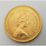 A 1974 Elizabeth II gold sovereign.