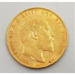 A 1907 Edward VII gold sovereign, London mint.