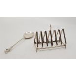 A silver six division toast rack, by Reid & Sons, assayed Birmingham 1932, of angular form, length