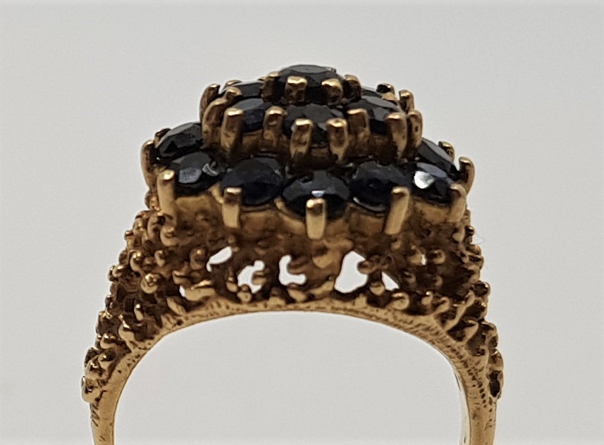 A 9ct, gold sapphire cluster ring, set numerous round cut sapphires with pierced oraganic form - Image 2 of 2