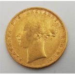 An 1880 Victoria "Young bust" gold sovereign, rev. St. George, London mint.