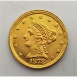 A replica/counterfeit US 1878 Quarter Eagle 2 1/2 dollars gold coin, with accent mark above number 8