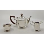 A three piece silver tea service, by Adie Brothers Ltd, the teapot Birmingham 1949 the others