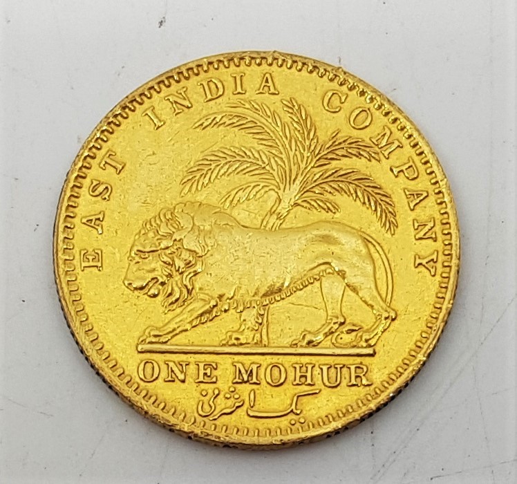 An East India Company 1841 Victoria One Mohur gold coin, obv. young bust, divided legend, crosslet