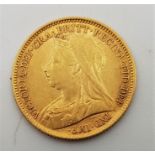 An 1899 Victoria "Veiled bust" gold half sovereign, London mint.