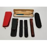 Two Mont Blanc black leather single pen holders, together with a Parker 61 case, a Samsonite green