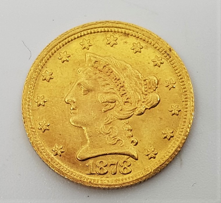 A replica/counterfeit US 1878 Quarter Eagle 2 1/2 dollars gold coin, with accent mark above number 8