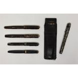 Four Parker Vacumatic pens, all with 14ct. gold nibs, together with a leather Parker Vacumatic pen