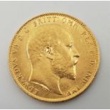 A 1908 Edward VII gold sovereign, London mint.