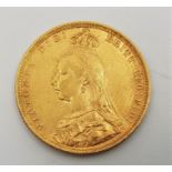 An 1890 Victoria "Jubilee bust" gold sovereign, London mint.