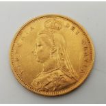 An 1890 Victoria "Jubilee bust" gold half sovereign, London mint.