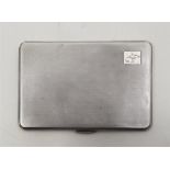 An engine turned silver rectangular cigarette case, by Smith & Bartlam, Birmingham 1917, 12.7cm x