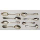 A small collection of Irish silver tea and condiment spoons, to include: A pair of George III fiddle