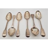 A set of three Victorian silver fiddle pattern table spoons, by John Stone, Exeter 1852, length 23.