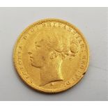 An 1881 Victoria "Young bust" gold sovereign, rev. St. George, Melbourne mint.