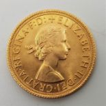 A 1963 Elizabeth II gold sovereign.