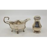 An Edwardian silver sauce boat, by E S Barnsley & Co, Birmingham 1906, together with a baluster form