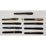 A large collection of various vintage fountain pens, to include: nine various Watermans fountain