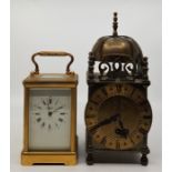 A 20th century Angelus gilt brass carriage clock, bell strike, having white enamel dial with Roman