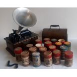 An oak cased Edison Phonograph with reels.