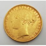 An 1879 Victoria "Young bust" gold sovereign, rev. St. George, Melbourne mint.