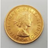 A 1963 Elizabeth II gold sovereign.