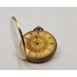 A precious yellow metal open face pocket watch, key wind, having engraved and engine turned dial
