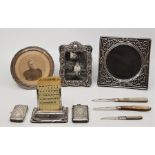 A quantity of small silver collectables, to include: A silver perpetual desk calendar, by William