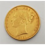 An 1861 Victoria "Young bust" gold sovereign, rev. shield.