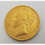 An 1853 Victoria "Young bust" gold sovereign, rev. shield