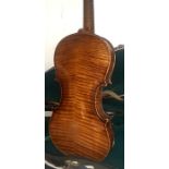 A full size German violin labelled Guanerius,14inch back no cracks or faults with bow en-suite