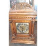 An early 20th cent large oak cased mantle clock