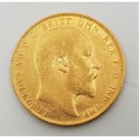 A 1906 Edward VII gold sovereign, London mint.