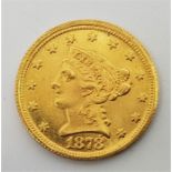 A replica/counterfeit US 1878 Quarter Eagle 2 1/2 dollars gold coin, with accent mark above number 8