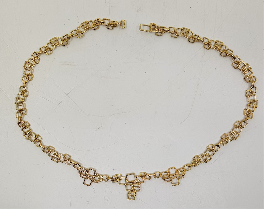 A 1970's 9ct. gold necklace, formed from a series of links fashioned as overlapping graduated open - Image 2 of 2