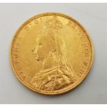 An 1891 Victoria "Jubilee bust" gold sovereign, London mint.