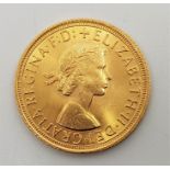 A 1963 Elizabeth II gold sovereign.