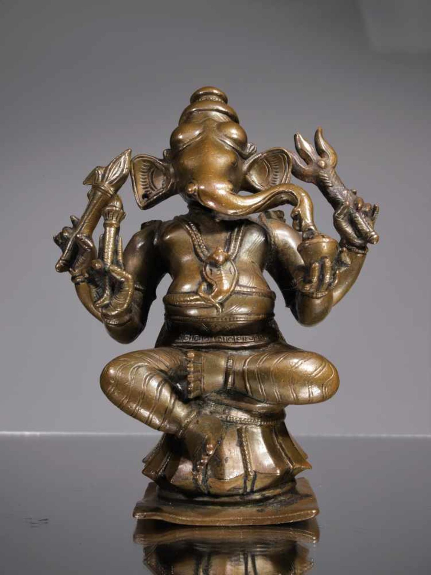 SITTING GANESHABronzeSouth - India , Maharashtra , 18th centuryDimensions: Height 17,5 cm Wide 13 cm