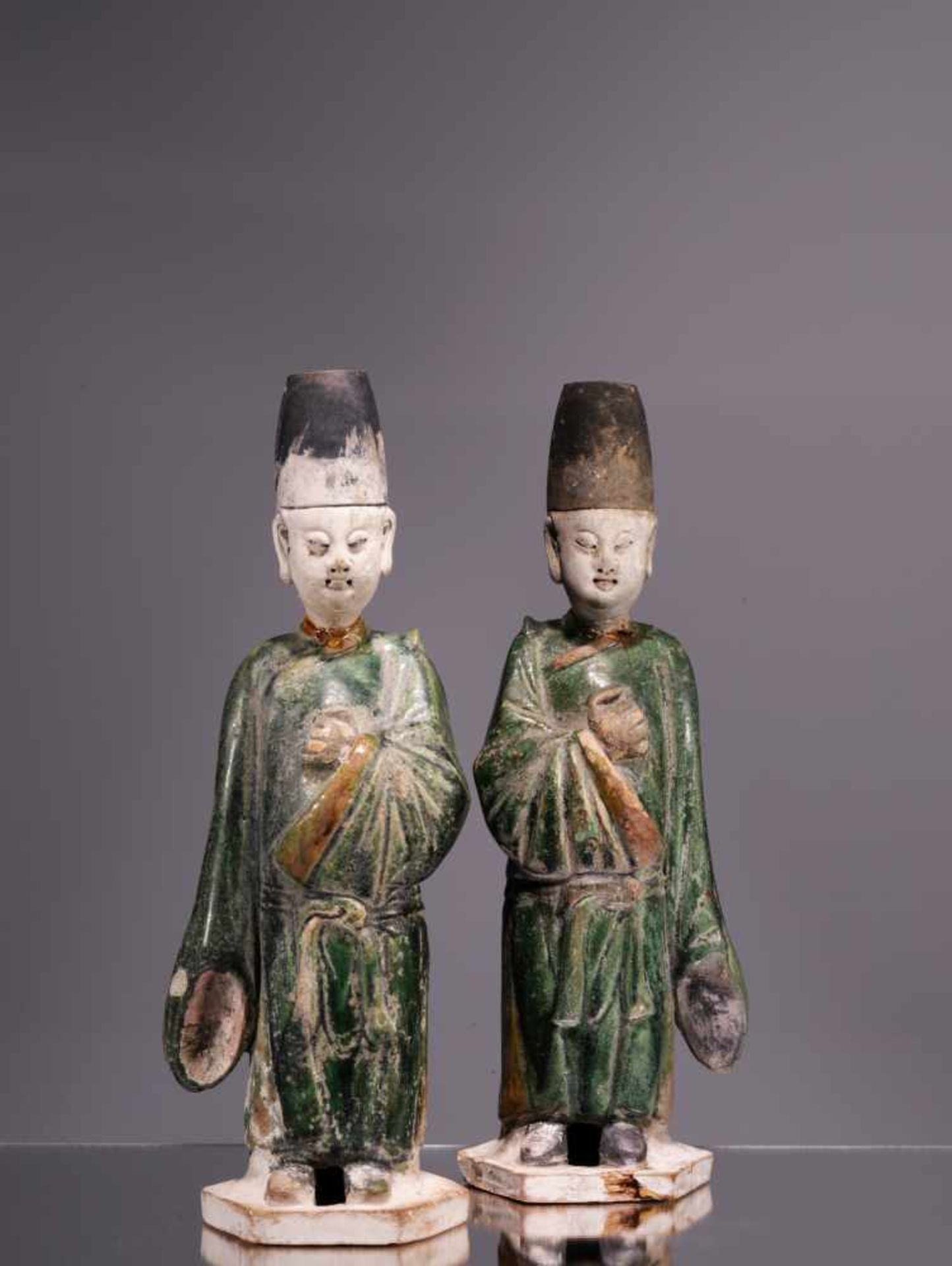 TWO CHINESE OFFICIALSPainted earthenwareChina , Ming Dynasty Dimensions: Height 33 cmWeight: Both