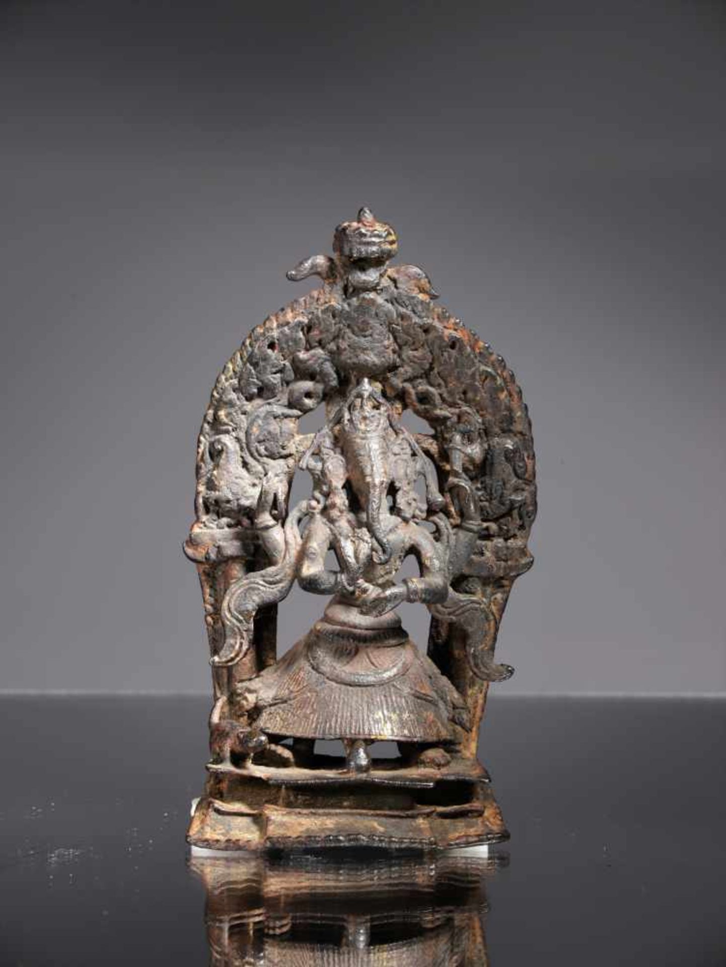 STANDING GANESHABronze,Nepal, 16th centuryDimensions: Height 11 cmWeight: 242 gramsAn old bronze