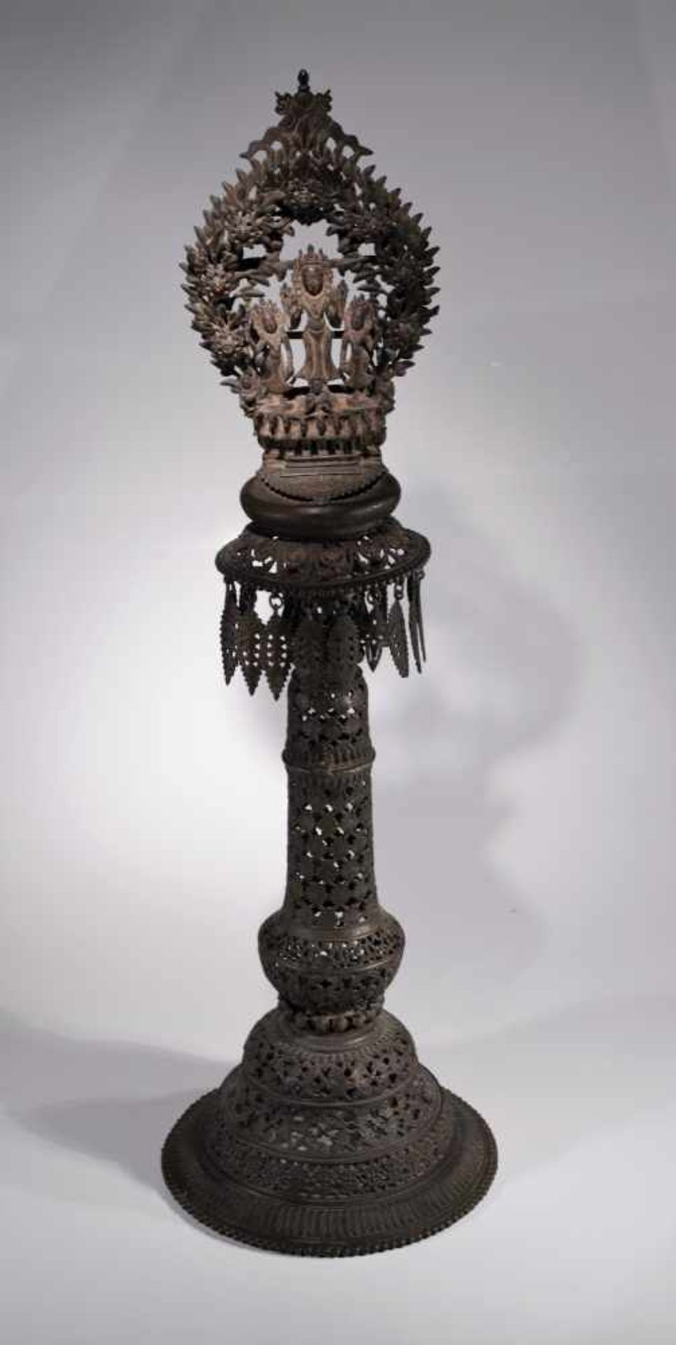 OFFERING LAMPBronze cast in several parts,Nepal 17th centuryDimensions: Height 117 cm , Wide 35 cm ,