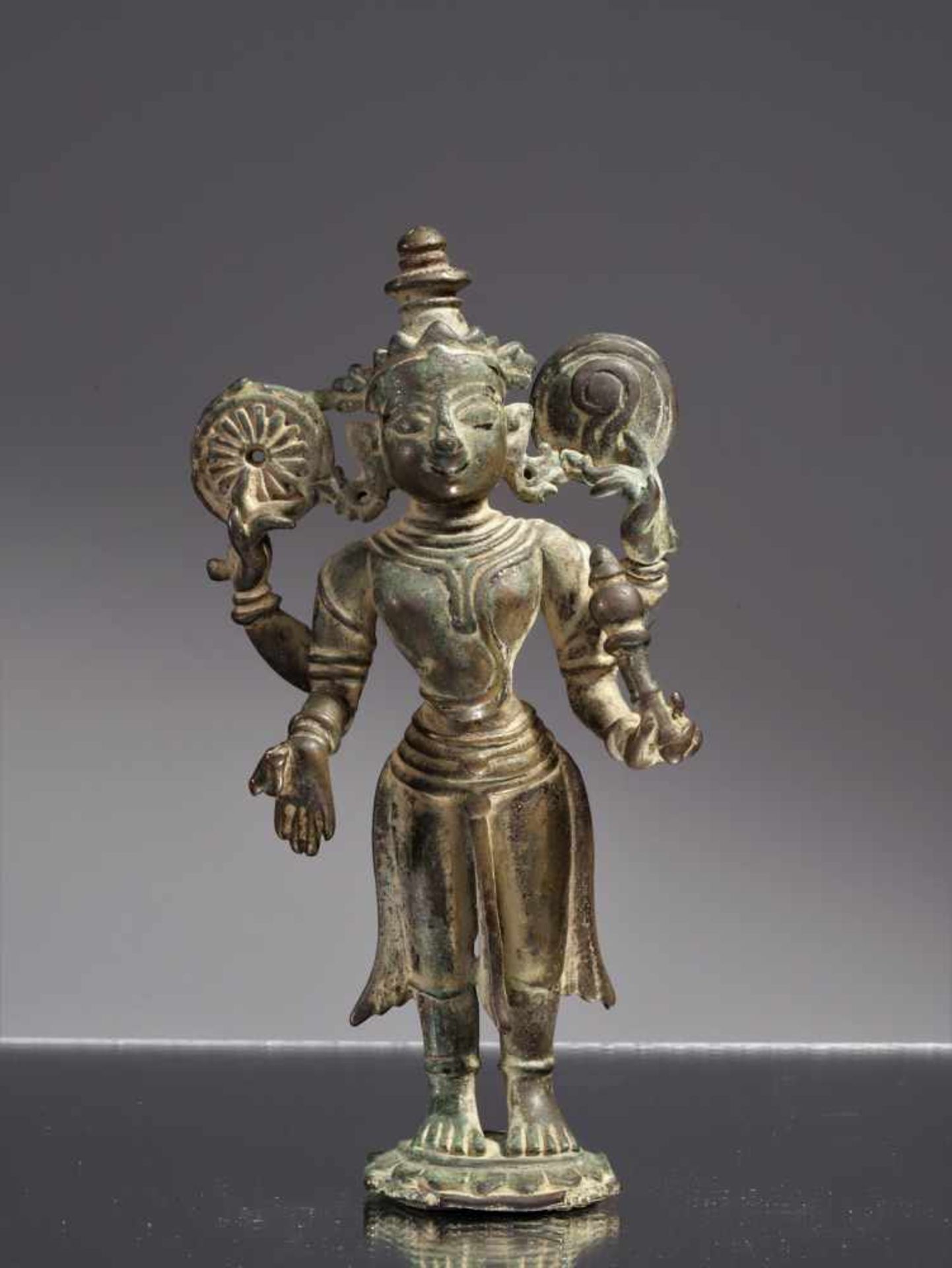 VISHNUBronzeIndia , 10th centuryDimensions: Height 14 cm ; Wide 8 cm ; Depth 3 cmWeight: 404