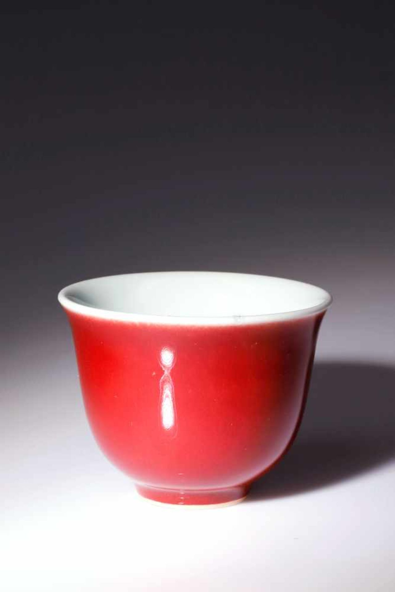 A RUBY-RED GLAZE CUP